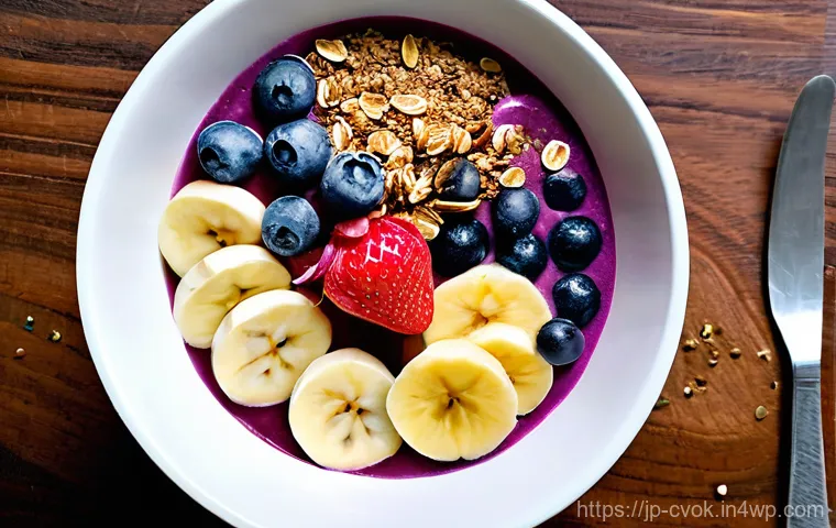 대체 단백질 요리법으로 만드는 스무디 볼 - **Morning Radiance Smoothie Bowl**
    A vibrant and wholesome smoothie bowl sits on a clean, minima...